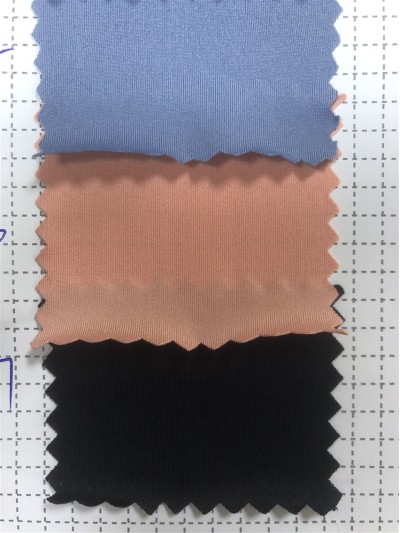 SX-DY 521010 50D milk silk polyester stretch frame Specification: 160CM Gram weight: 100G Composition: 88T 12SP ultra-thin sports cloth back view